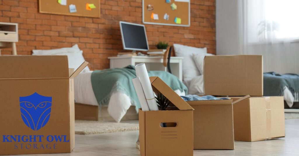Cardboard boxes in a bedroom representing storage solutions at Knight Owl Storage Beltline